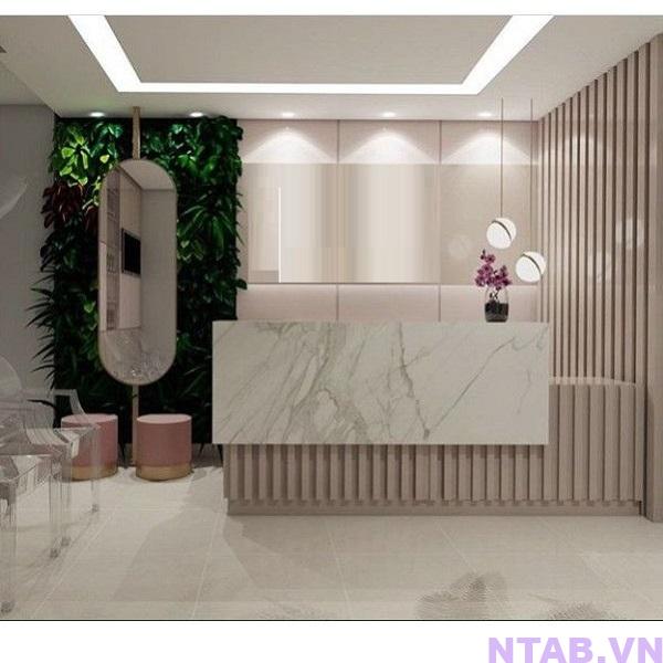 quay le tan van da op lam nhua QLT019 Quầy lễ tân vân đá ốp lam nhựa QLT019