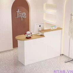 Quầy thu ngân vân gỗ phối trắng 1m2 QTN009